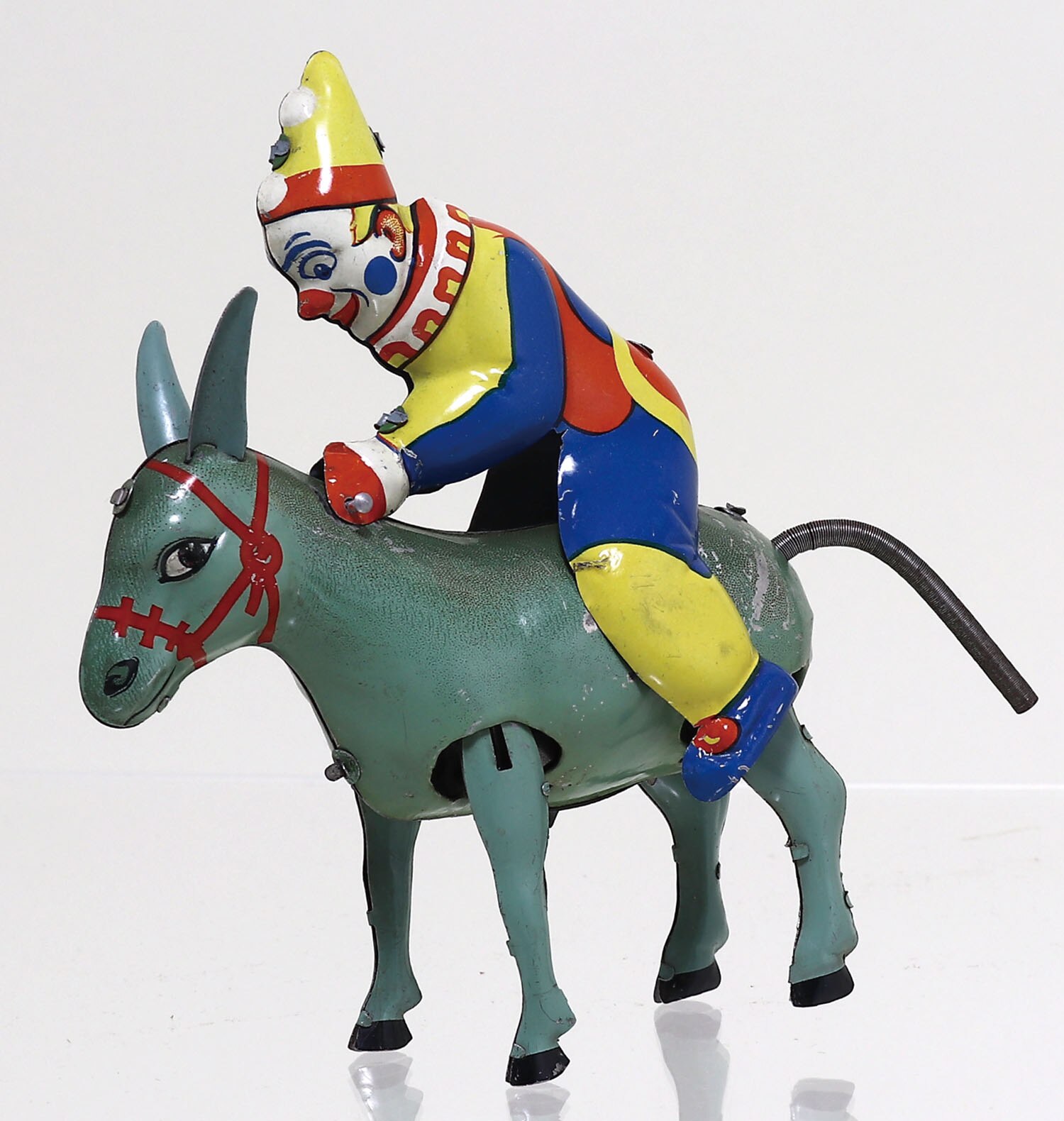 Clown riding a donkey
