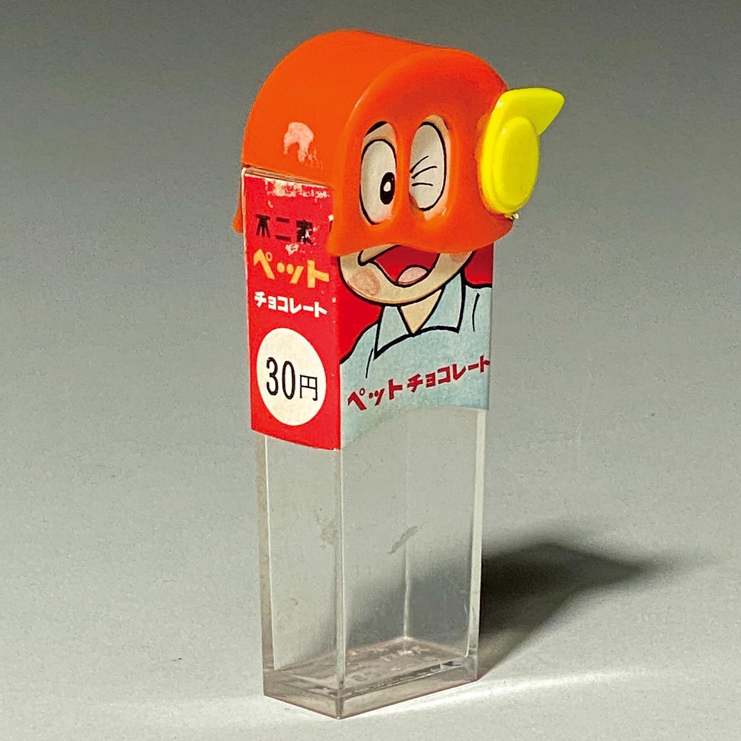 1258］ 不二家 パーマンペットチョコレート オレンジ 両面ウインク