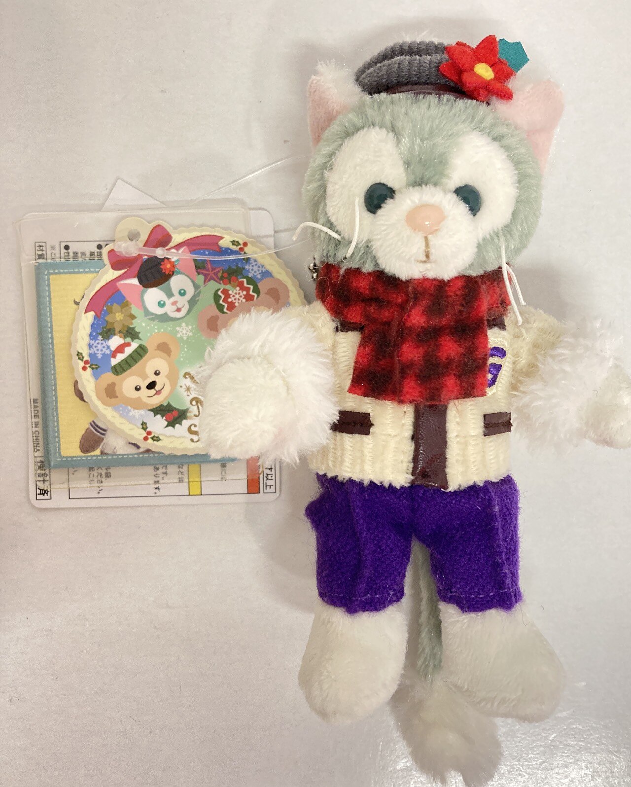 東京ディズニーシー ぬいぐるみバッジ ジェラトーニ 赤マフラー 帽子に花 ダッフィーのクリスマス Very Merry Snowtime 15 まんだらけ Mandarake