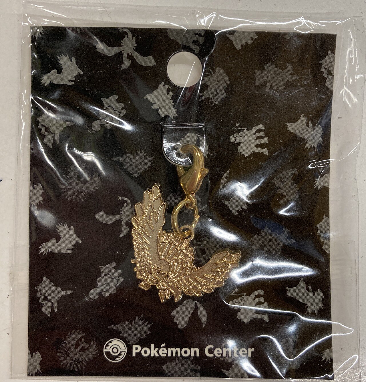 Pokemon Center Metal charm / Johto Book Special Color Pokemon HoOh