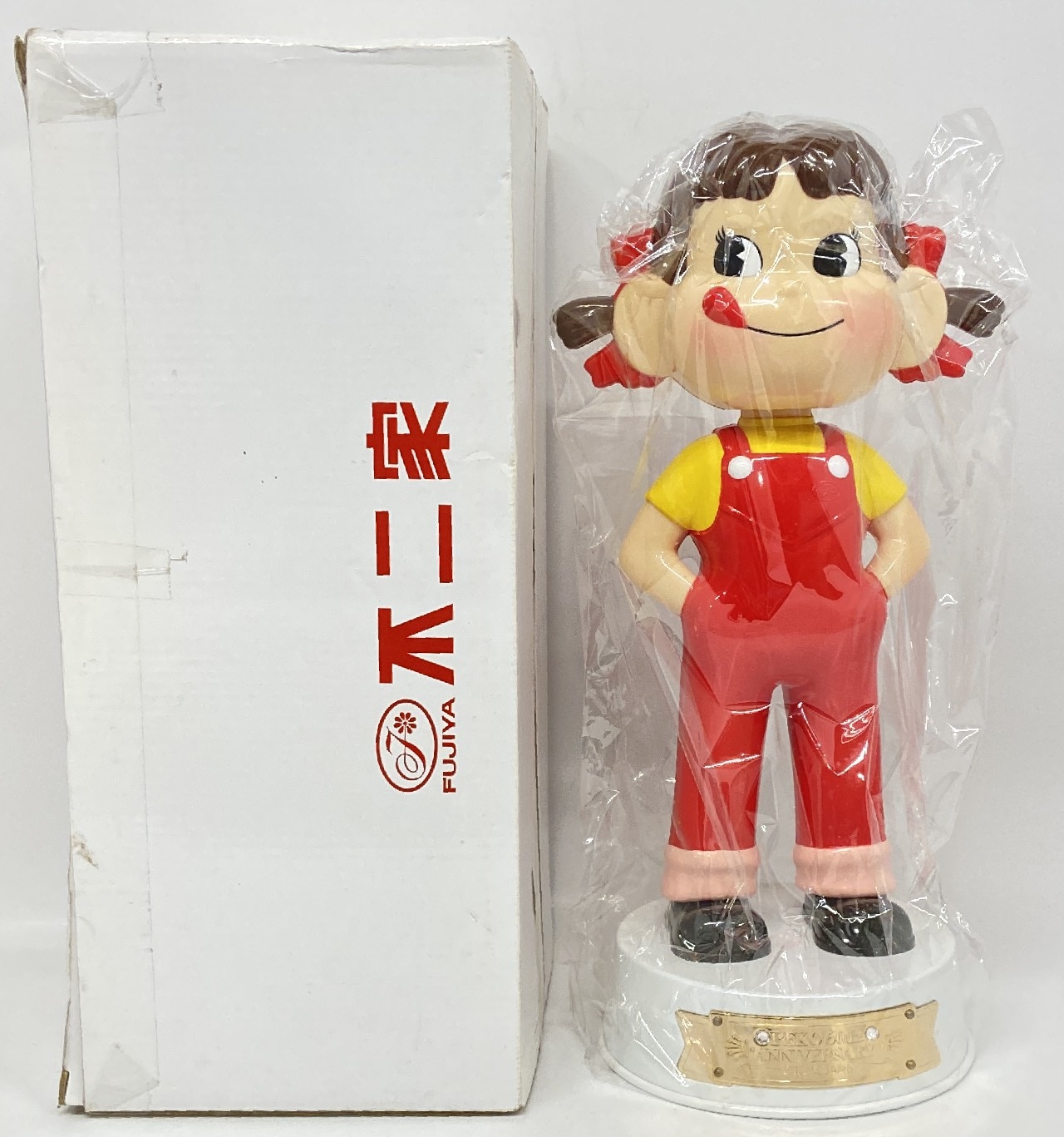 ペコちゃん60周年記念首ふり人形