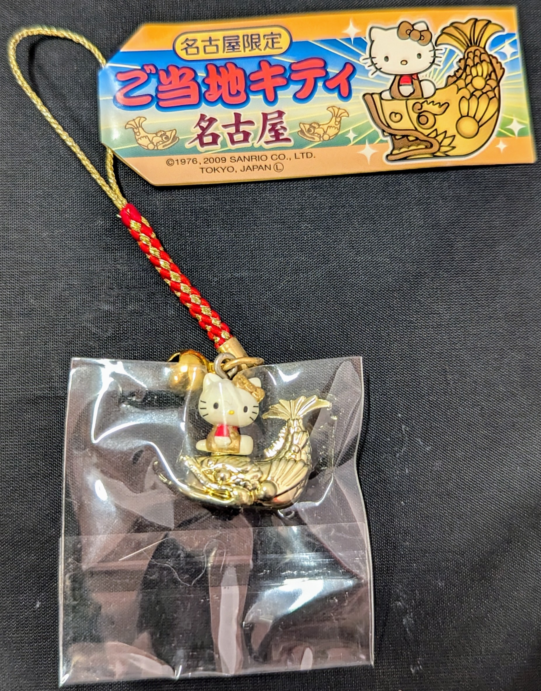 ノーブランド品キティ愛知名古屋限定Nagoyaしゃちほこキティ根付金赤ストラップご当地