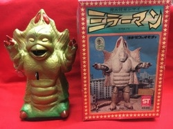 A Wind-up toy mirror man with ignition 