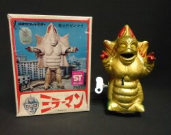 A Wind-up toy mirror man with ignition 
