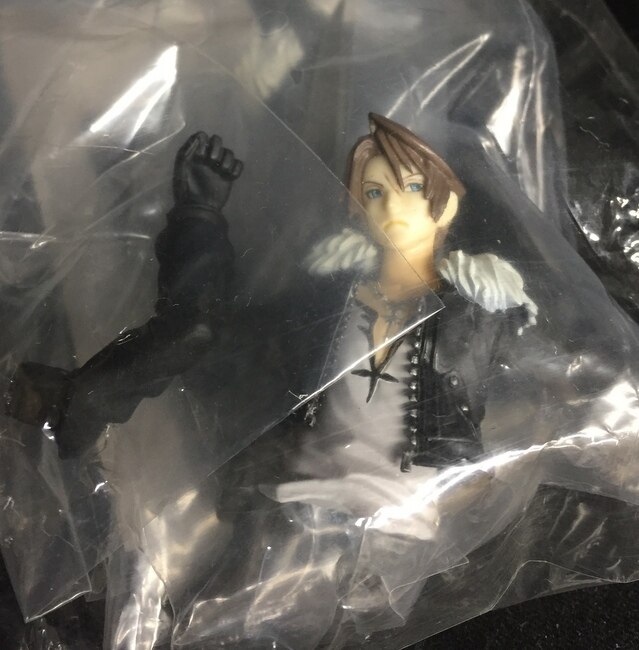 squareenixdissidiafftradingarts01squall99leonhart312028
