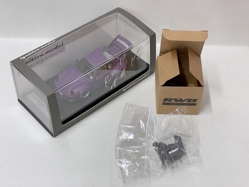 ignition model 1/43 RWB 993 Matte Purple With Mr. Nakai sitting on