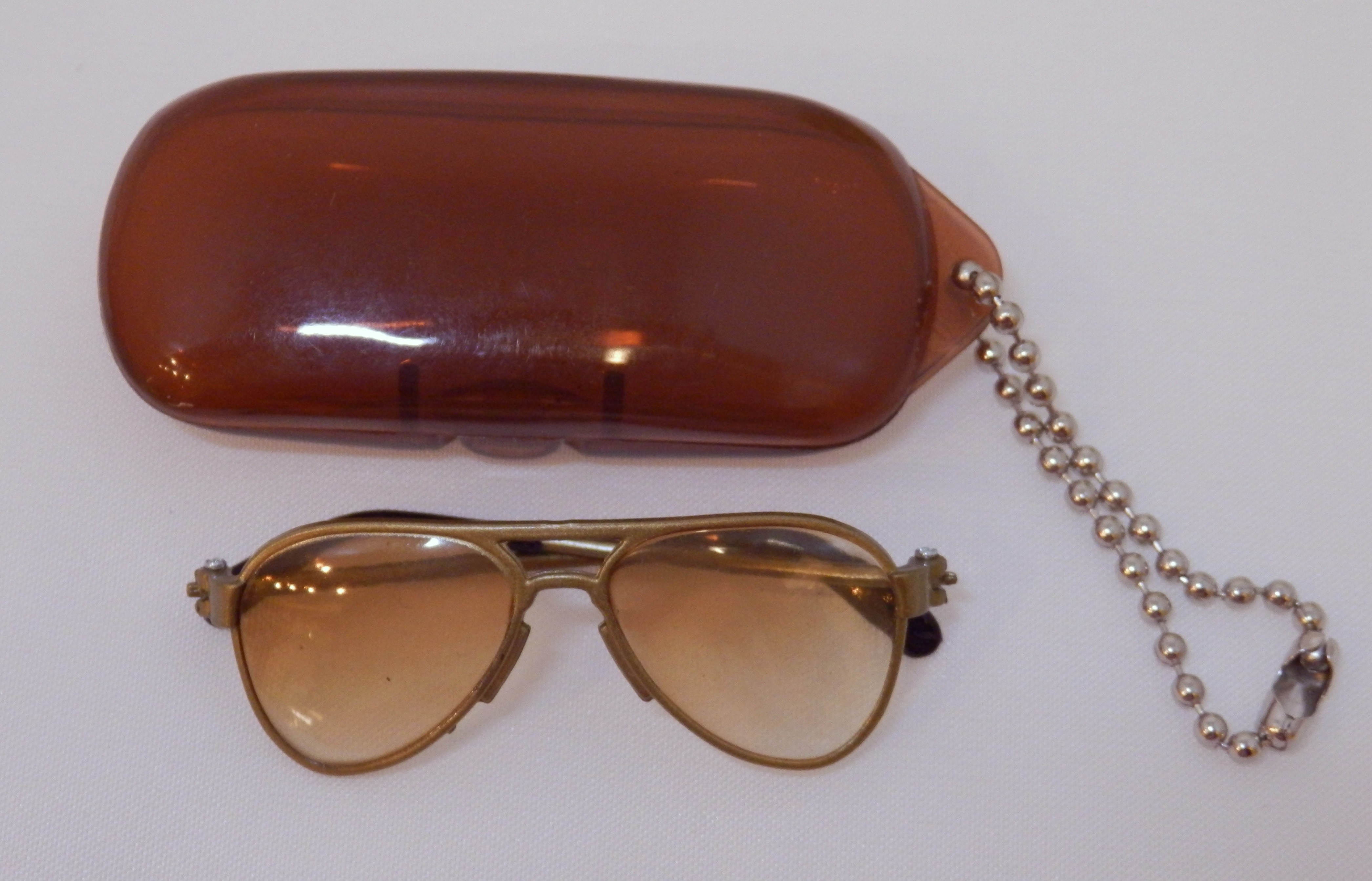 teardrop (brown case round)
