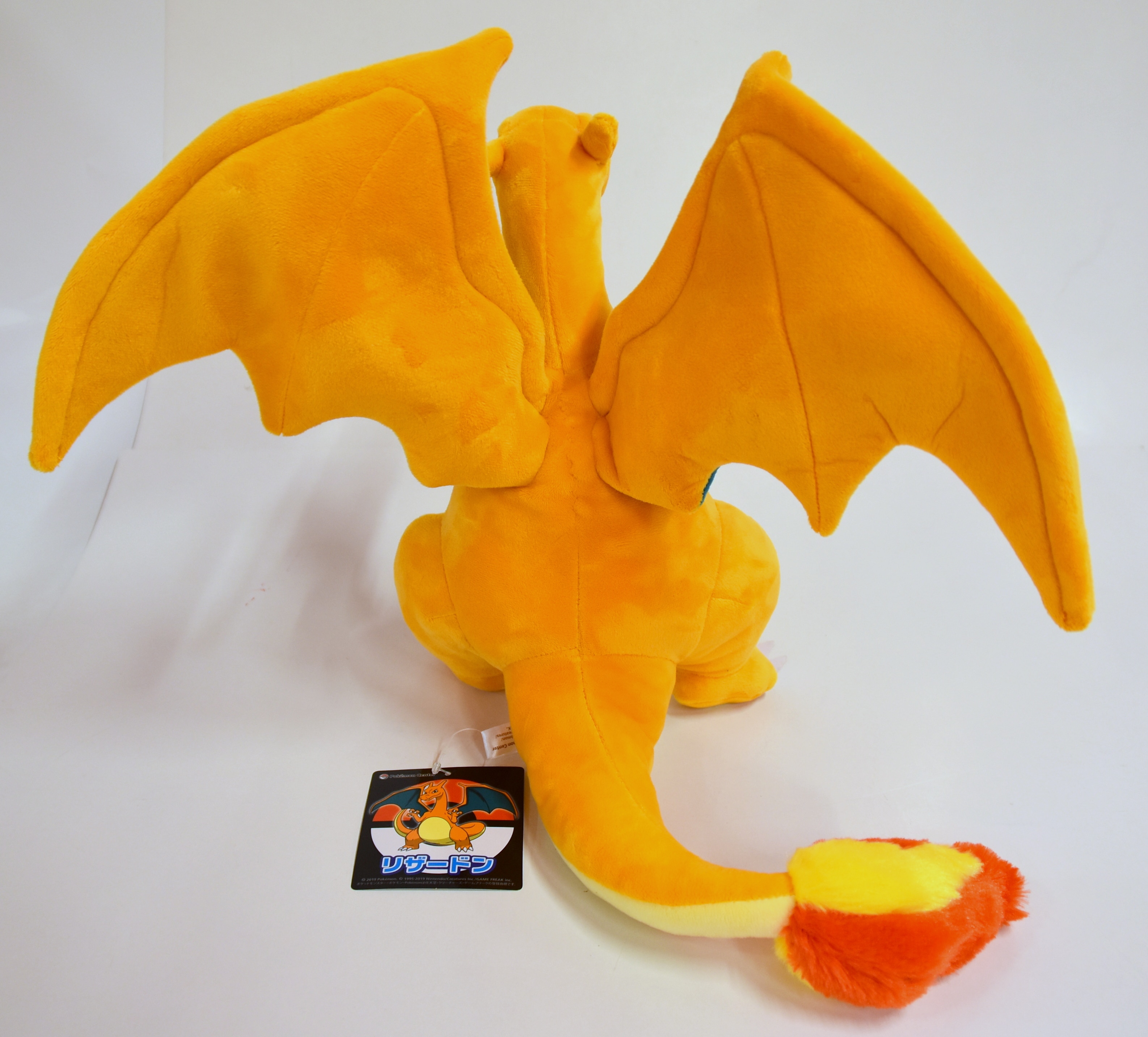 Pokemon center on sale charizard plush