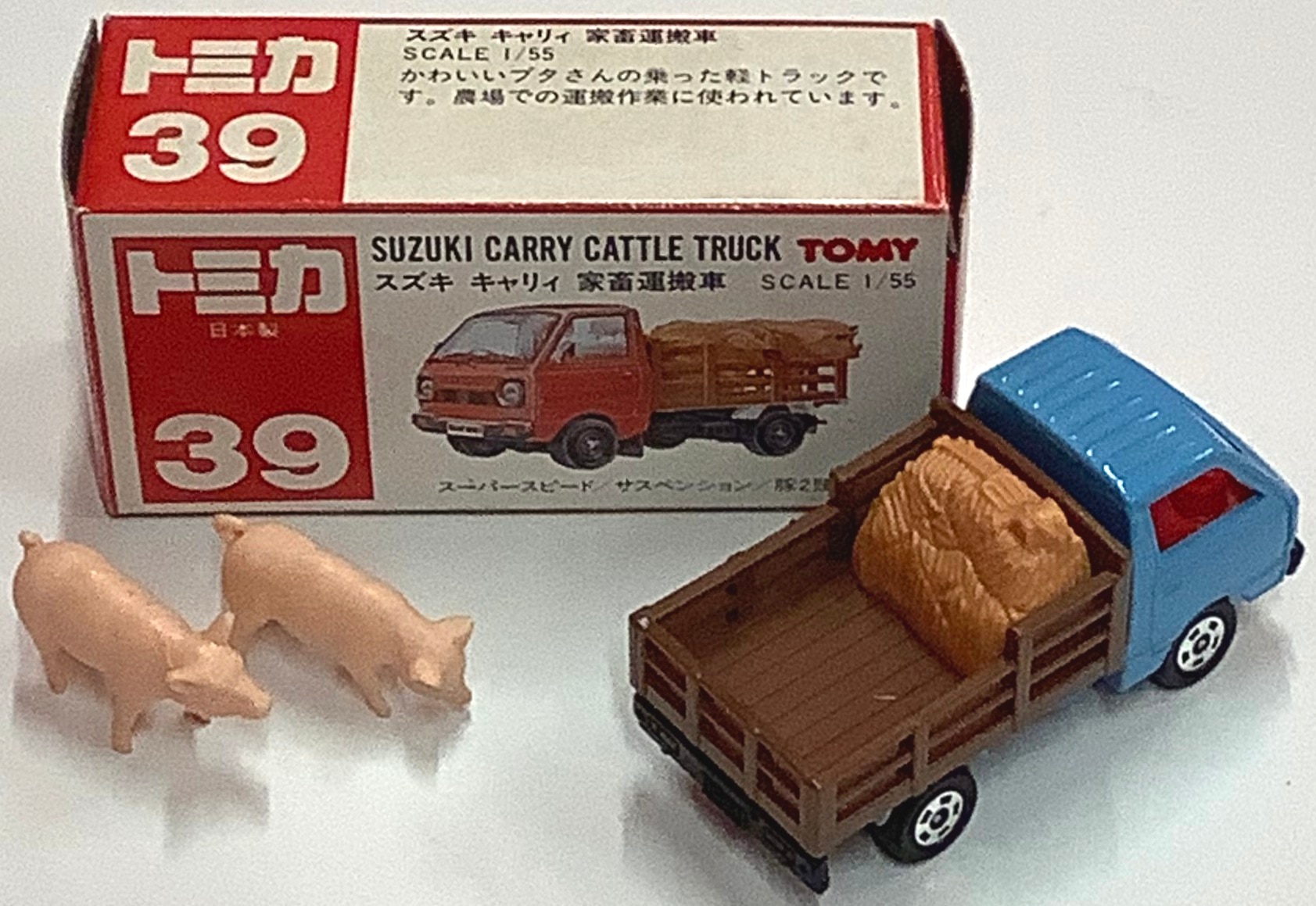 直販本物＊387 トミカ　赤箱ジャパン物　スズキ　キャリー　家畜運搬車　本体程度よいです　豚ちゃん2頭います！！　透明ケース付き 建設車両、作業車