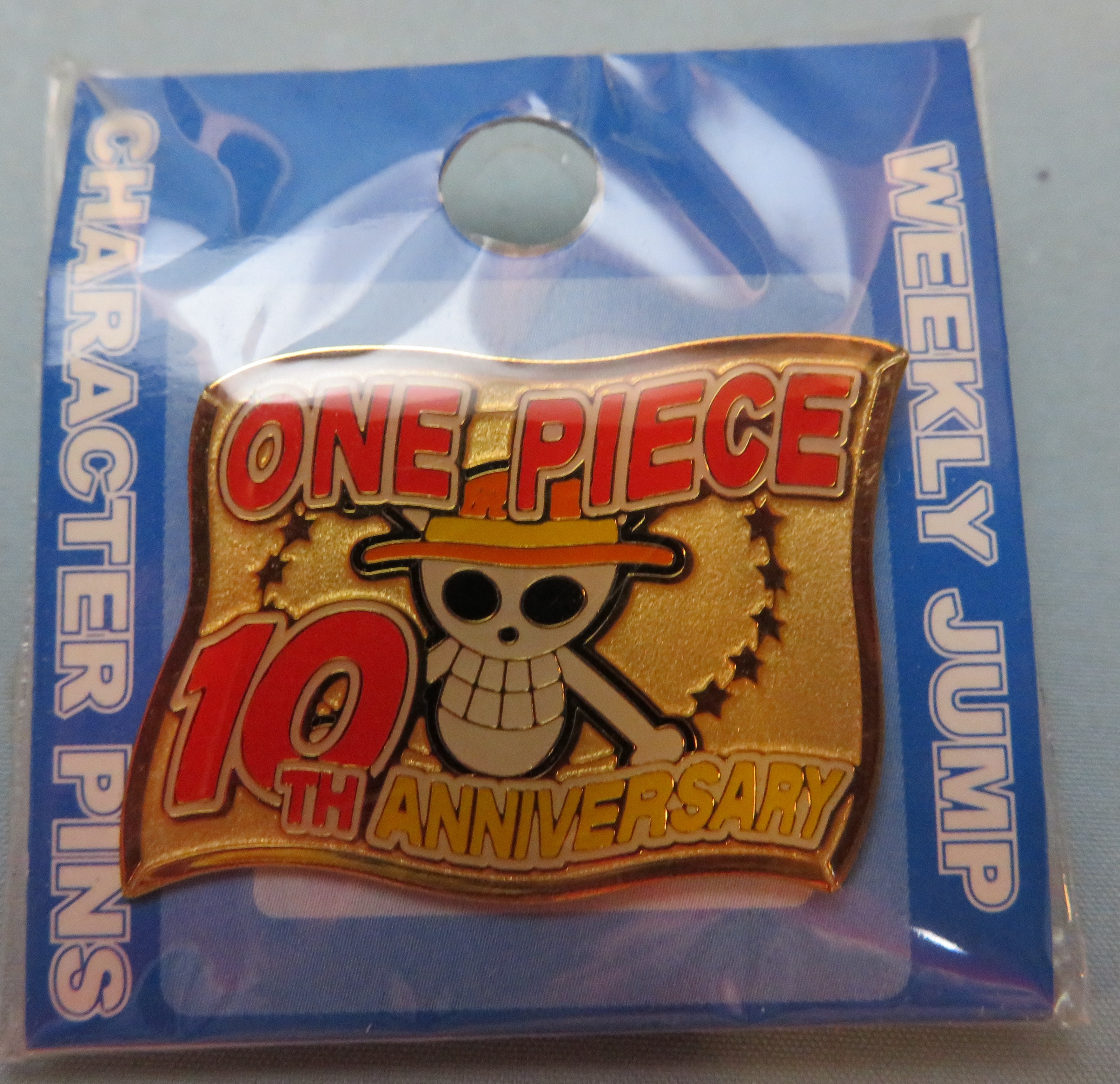 集英社 One Piece ピンズ 10周年記念ロゴ まんだらけ Mandarake