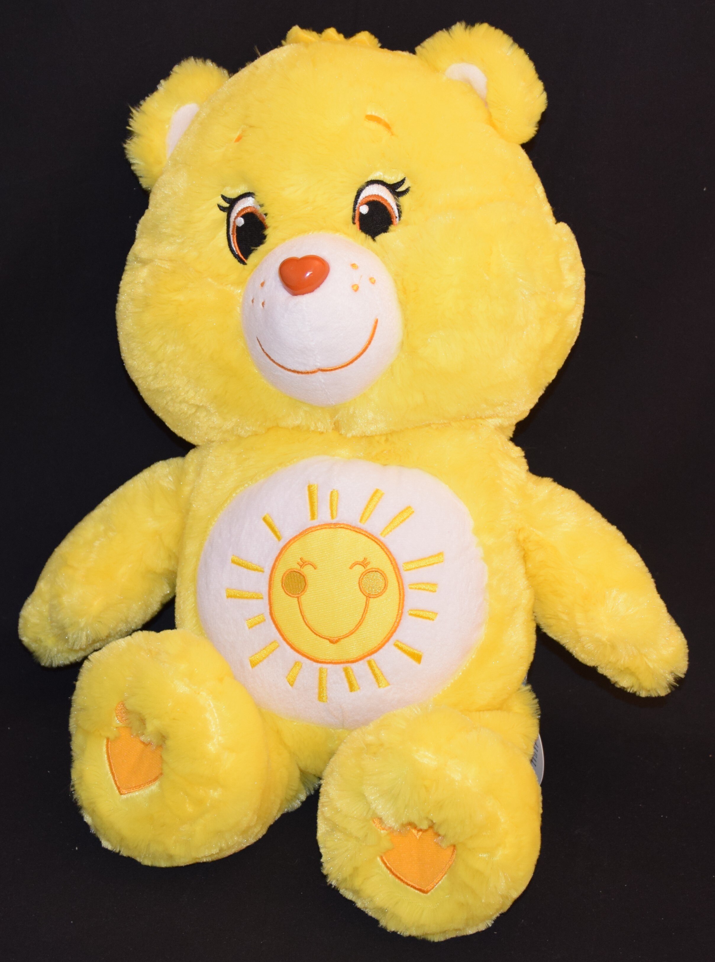 yellow care bear plush